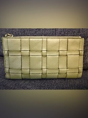 FREE FREE with $400 purchase. Looks like  Bottega Veneta not sure unbranded